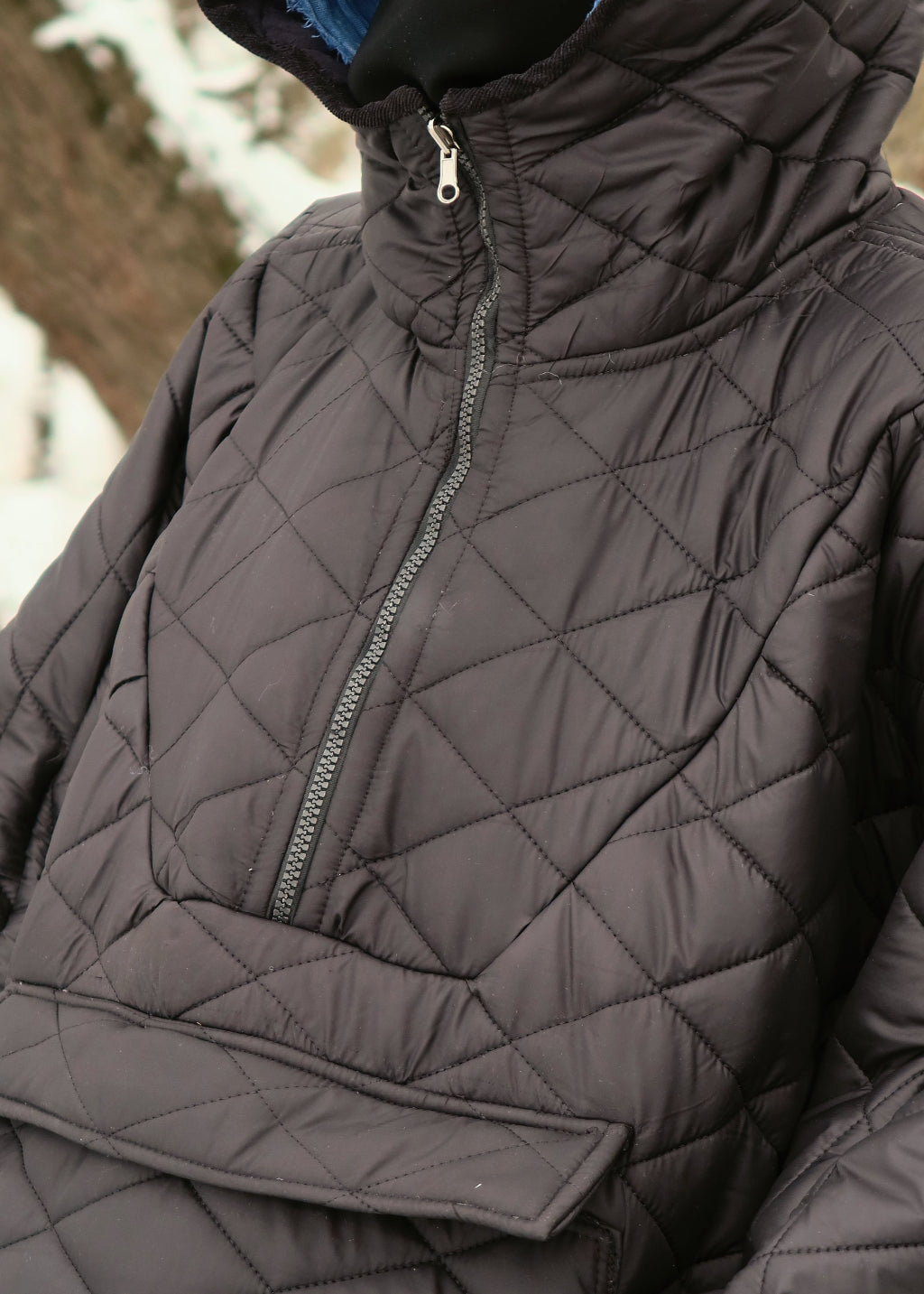 CAPE MATELASSÉE À CAPUCHE